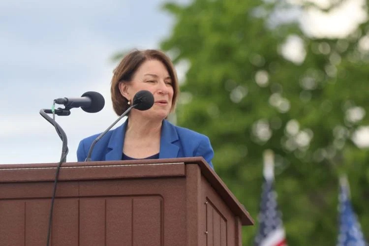 Sen. Amy Klobuchar speaks May 26, 2024, during a Memorial Day ceremony at the Minnesota State Veteran's Cemetery in Little Falls. by Jeff Hage / Morrison County Record